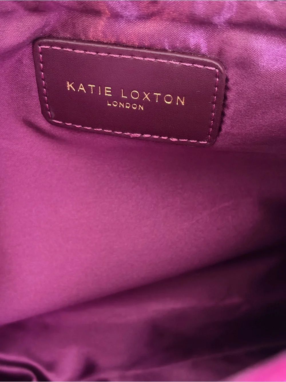 Katie Loxton magenta crushed velvet pouch bag